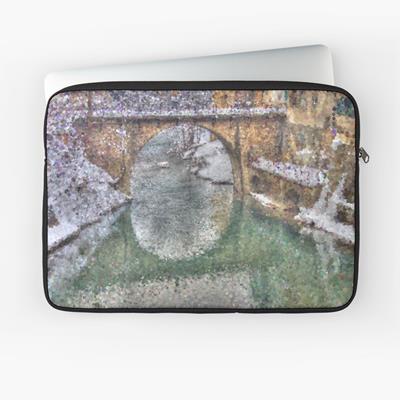 Snowy Stone Bridge Over Water
